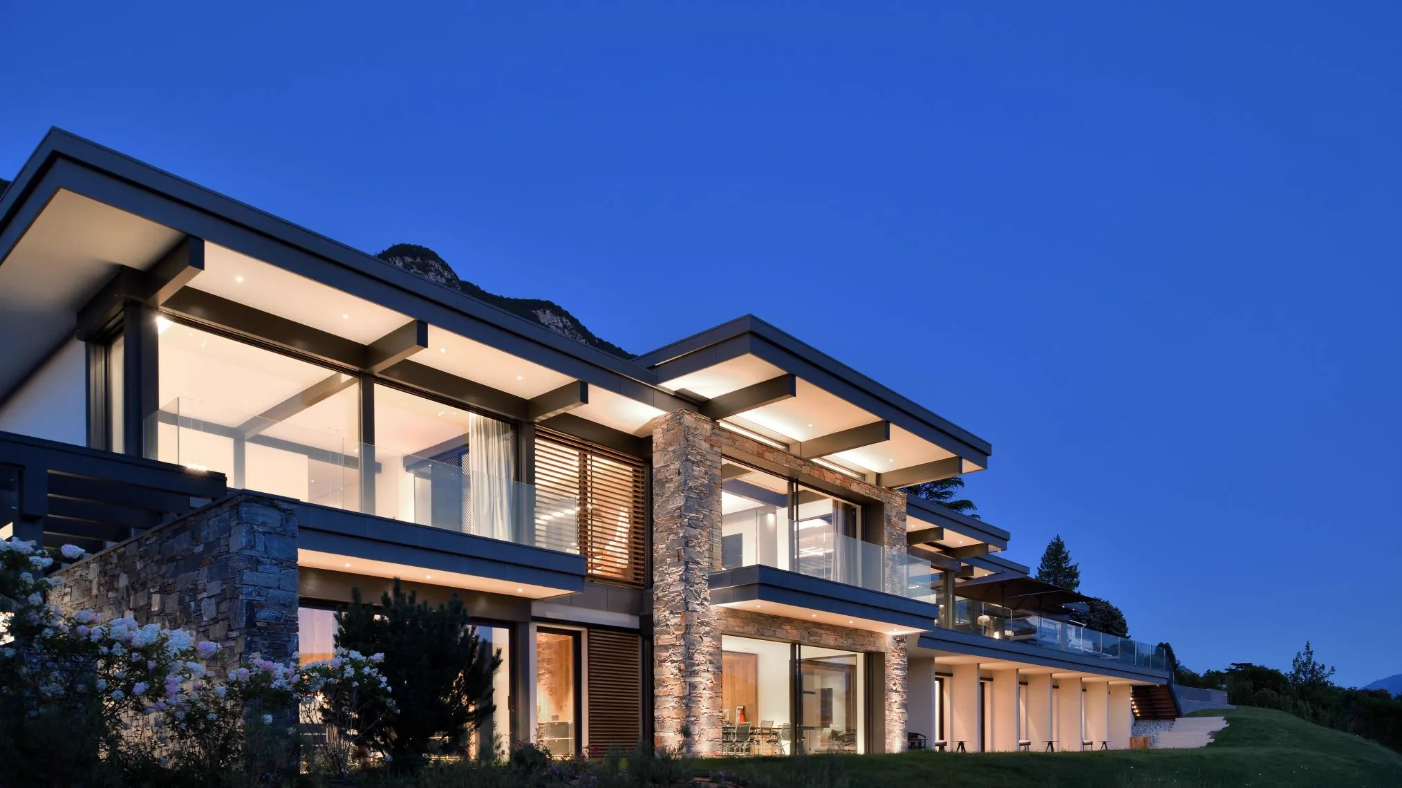 Archidomo architectural project — modern villa at twilight